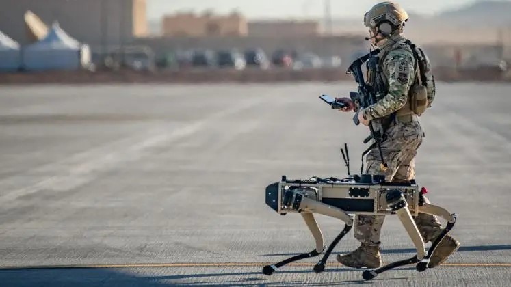 Soldier with an AI robot dog.